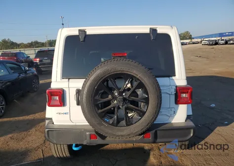 2023 Jeep Wrangler Sahara 4Xe from USA, damaged, VIN 1C4JJXP65PW553531